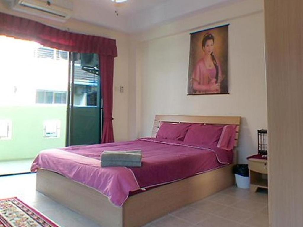 Billabong Hotel Pattaya Chambre photo