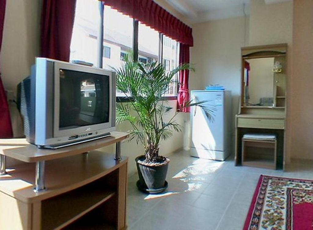 Billabong Hotel Pattaya Chambre photo
